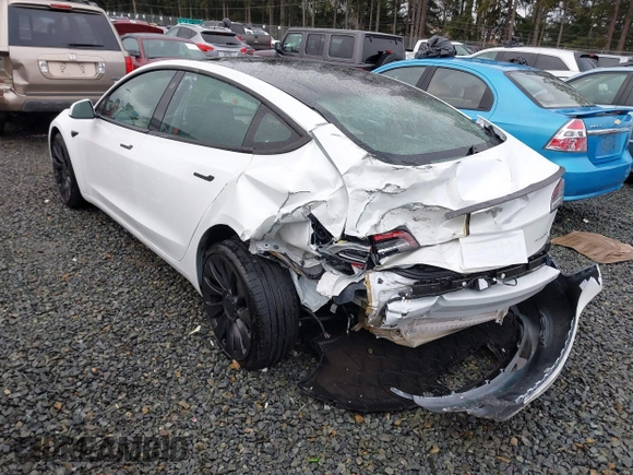 2023 Tesla Model 3 Performance z VIN 5YJ3E1EC9PF545648, wystawiony jako IAAI lot #41573583 z przebiegiem 15 207 mil mil oraz . Historia ofert i sprzedaży dostępna na DreamBid. Obrazek 3.