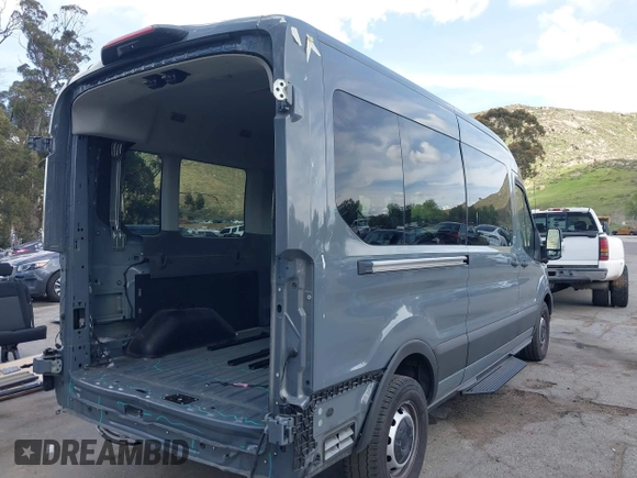 2023 Ford Transit Passenger XL with VIN 1FBAX2C82PKB58582, listed as a IAAI auction lot 41898895 with 16,416 mi miles and . Bid and sale history available at DreamBid. Image 4.