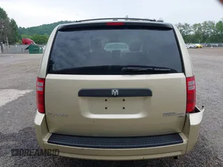 2010 Dodge Grand Caravan Hero z VIN 2D4RN3D17AR390232, wystawiony jako IAAI lot #42301567 z przebiegiem 102 004 mil mil oraz . Historia ofert i sprzedaży dostępna na DreamBid. Obrazek 16.