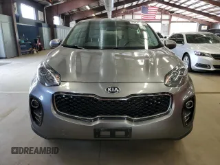 2018 Kia Sportage LX z VIN KNDPMCAC5J7426921, wystawiony jako Copart lot #57848805 z przebiegiem 128 089 mil mil oraz Czysty tytuł • Clean title. Historia ofert i sprzedaży dostępna na DreamBid. Obrazek 5.