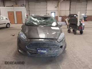 2015 Ford Fiesta SE with VIN 3FADP4BJ7FM218586, listed as a IAAI auction lot 41603479 with 97,460 mi miles. Bid and sale history available at carsss.com. Image 12.