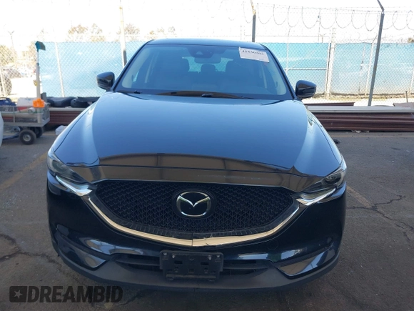 2020 Mazda CX-5 Grand Touring z VIN JM3KFADMXL0740144, wystawiony jako IAAI lot #41830203 z przebiegiem 70 535 mil mil oraz . Historia ofert i sprzedaży dostępna na DreamBid. Obrazek 12.