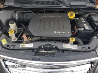 2015 Chrysler Town & Country Touring-L with VIN 2C4RC1CG4FR506913, listed as a Copart auction lot 82864954 with 104,778 mi miles and Salvage Title. Bid and sale history available at carsss.com. Image 12.
