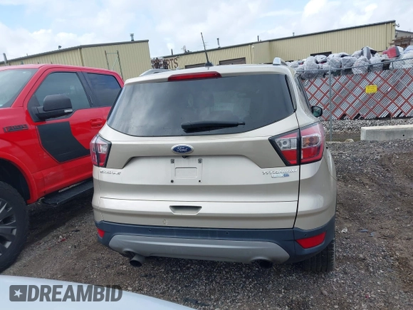 2017 Ford Escape Titanium with VIN 1FMCU9JD1HUB05881, listed as a IAAI auction lot 41966842 with 185,963 mi miles. Bid and sale history available at carsss.com. Image 16.