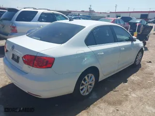 2014 Volkswagen Jetta Sedan SE with VIN 3VWD07AJ2EM310654, listed as a IAAI auction lot 41997453 with 126,801 mi miles. Bid and sale history available at carsss.com. Image 4.