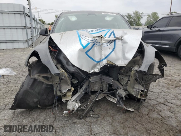 2024 Tesla Model Y Long Range with VIN 7SAYGDEE8RA238798, listed as a Copart auction lot 54401175 with Not provided miles and Salvage title. Bid and sale history available at DreamBid. Image 5.