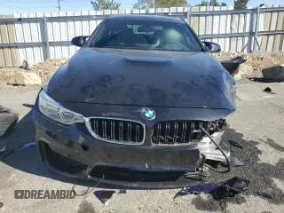 2015 BMW M4 with VIN WBS3R9C53FK330591, listed as a Copart auction lot 67761113 with 23,799 mi miles. Bid and sale history available at carsss.com. Image 5.