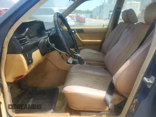 1986 Mercedes-Benz 300 E z VIN WDBEA30D8GA318345, wystawiony jako Copart lot #59481785 z przebiegiem 47 646 mil mil oraz Czysty tytuł • Clean title. Historia ofert i sprzedaży dostępna na DreamBid. Obrazek 7.