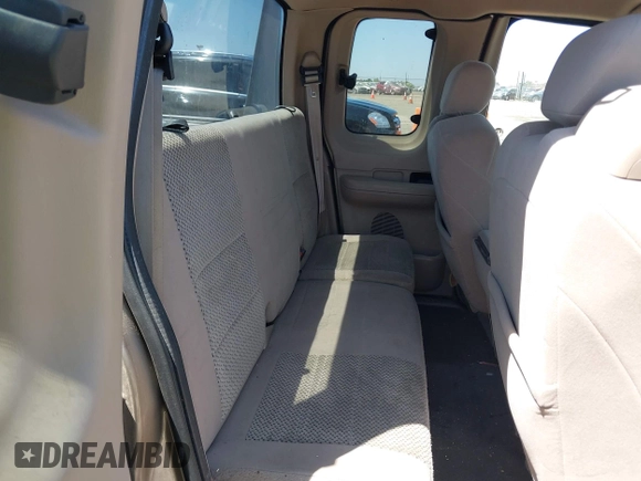 2002 Ford F-150 XL with VIN 1FTRX17272KE07014, listed as a IAAI auction lot 42381725 with 212,294 mi miles and . Bid and sale history available at DreamBid. Image 8.