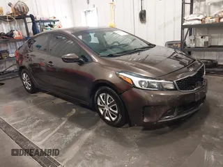 2017 Kia Forte LX with VIN 3KPFK4A71HE056667, listed as a IAAI auction lot 42030307 with 99,320 mi miles. Bid and sale history available at carsss.com. Image 1.