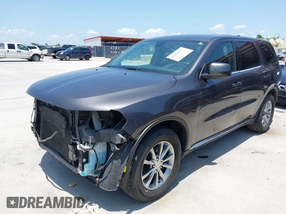 2016 Dodge Durango SXT with VIN 1C4RDHAG0GC301611, listed as a IAAI auction lot 42486013 with 136,997 mi miles and . Bid and sale history available at DreamBid. Image 2.