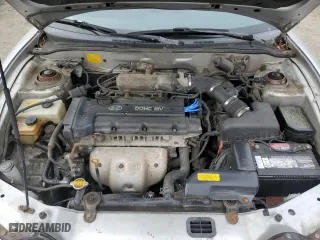 2001 Hyundai Tiburon with VIN KMHJG35F31U224416, listed as a Copart auction lot 83243684 with 59,473 mi miles and Salvage Title. Bid and sale history available at carsss.com. Image 11.