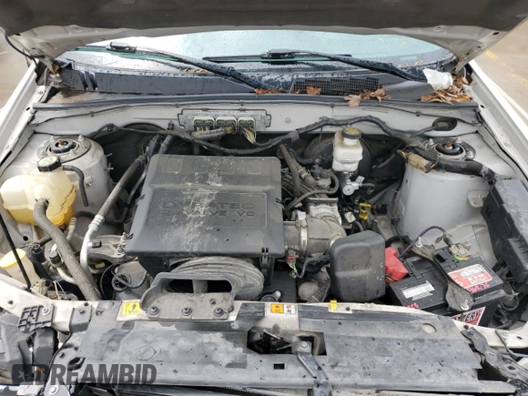 2010 Ford Escape Limited z VIN 1FMCU9EG2AKB77985, wystawiony jako Copart lot #56747655 z przebiegiem 88 362 mil mil oraz Szkoda całkowita • Salvage title. Historia ofert i sprzedaży dostępna na DreamBid. Obrazek 11.