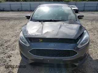 2017 Ford Focus SE with VIN 1FADP3F23HL244619, listed as a Copart auction lot 61057515 with Not provided miles and Salvage title. Bid and sale history available at DreamBid. Image 5.