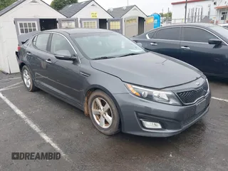 2015 Kia Optima LX z VIN KNAGM4A73F5624101, wystawiony jako IAAI lot #40746046 z przebiegiem 166 468 mil mil oraz . Historia ofert i sprzedaży dostępna na DreamBid. Obrazek 1.
