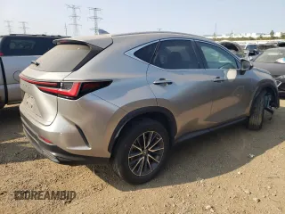 2022 Lexus NX with VIN 2T2ADCAZ4NC002379, listed as a Copart auction lot 71153604 with 26,490 mi miles and Salvage Title. Bid and sale history available at carsss.com. Image 3.