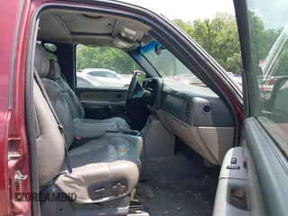 2002 Chevrolet Suburban LT with VIN 1GNFK16Z72J121807, listed as a IAAI auction lot 42384303 with Not provided miles and . Bid and sale history available at DreamBid. Image 5.
