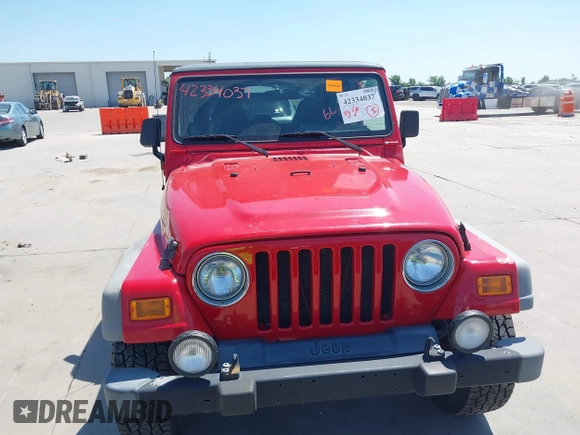 2001 Jeep Wrangler Sport with VIN 1J4FA49S11P375854, listed as a IAAI auction lot 42334037 with 215,027 mi miles and . Bid and sale history available at DreamBid. Image 6.