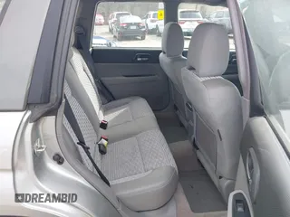 2005 Subaru Forester XS with VIN JF1SG65695H735272, listed as a IAAI auction lot 41949103 with 105,780 mi miles and . Bid and sale history available at DreamBid. Image 8.