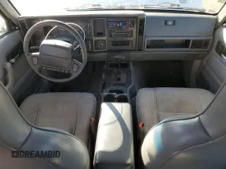 1996 Jeep Cherokee Sport with VIN 1J4FJ68S7TL325967, listed as a Copart auction lot 43654245 with 204,182 mi miles and Salvage Title. Bid and sale history available at carsss.com. Image 8.