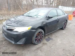 2013 Toyota Camry Hybrid LE with VIN 4T1BD1FK3DU094929, listed as a IAAI auction lot 41852028 with 334,055 mi miles. Bid and sale history available at carsss.com. Image 2.