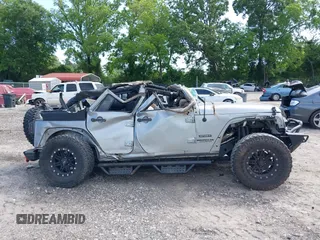 2017 Jeep Wrangler Unlimited Sport with VIN 1C4HJWDG6HL592265, listed as a IAAI auction lot 42335663 with 89,314 mi miles and . Bid and sale history available at DreamBid. Image 12.