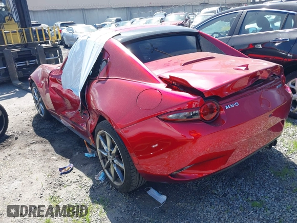 2021 Mazda MX-5 Miata Grand Touring с VIN JM1NDAM71M0459437, выставлен на аукционе IAAI как лот 41808704 с пробегом 19 368 миль миль и . История ставок и продаж доступна на DreamBid. Изображение 3.