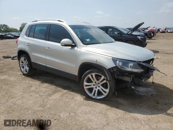 2013 Volkswagen Tiguan S with VIN WVGAV3AX6DW588083, listed as a Copart auction lot 60114965 with 109,318 mi miles and Salvage title. Bid and sale history available at DreamBid. Image 4.
