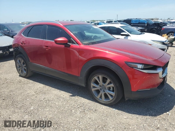 2022 Mazda CX-30 S Select with VIN 3MVDMBBL4NM419075, listed as a Copart auction lot 56323925 with 94,964 mi miles and Salvage title. Bid and sale history available at DreamBid. Image 4.