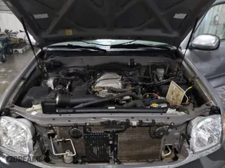 2000 Toyota Tundra SR5 with VIN 5TBRT3414YS093920, listed as a IAAI auction lot 41622228 with 239,064 mi miles. Bid and sale history available at carsss.com. Image 10.