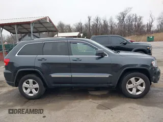2013 Jeep Grand Cherokee Laredo with VIN 1C4RJFAG9DC506238, listed as a IAAI auction lot 41800981 with 172,676 mi miles. Bid and sale history available at carsss.com. Image 13.