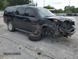 2011 GMC Yukon XL SLT with VIN 1GKS1KE09BR232187, listed as a Copart auction lot 69174634 with Not Provided miles and Salvage Title. Bid and sale history available at carsss.com. Image 4.