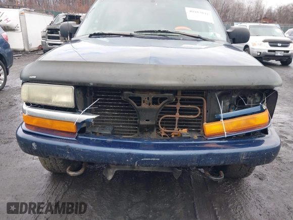 2004 Chevrolet Blazer LS z VIN 1GNDT13X54K156205, wystawiony jako IAAI lot #40983841 z przebiegiem 191 877 mil mil oraz . Historia ofert i sprzedaży dostępna na DreamBid. Obrazek 6.