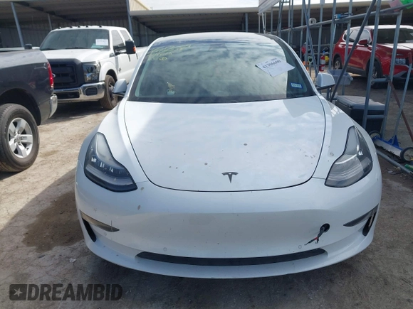 2019 Tesla Model 3 Mid Range with VIN 5YJ3E1EA6KF464615, listed as a IAAI auction lot 41306600 with 79,478 mi miles and . Bid and sale history available at DreamBid. Image 11.