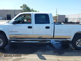 2004 GMC Sierra 2500HD SLE z VIN 1GTHK23U94F238875, wystawiony jako IAAI lot #42162219 z przebiegiem Nie podano mil oraz . Historia ofert i sprzedaży dostępna na DreamBid. Obrazek 14.