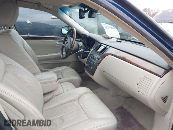 2009 Cadillac DTS 1SA z VIN 1G6KD57Y19U137656, wystawiony jako IAAI lot #41531439 z przebiegiem 103 151 mil mil oraz . Historia ofert i sprzedaży dostępna na DreamBid. Obrazek 5.