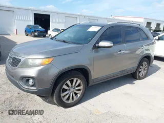 2011 Kia Sorento EX with VIN 5XYKU4A10BG113603, listed as a IAAI auction lot 42123052 with 238,437 mi miles. Bid and sale history available at carsss.com. Image 2.