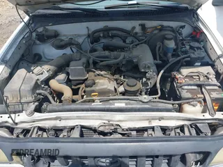 2001 Toyota Tacoma z VIN 5TENL42N11Z770366, wystawiony jako IAAI lot #42339570 z przebiegiem 427 064 mil mil oraz . Historia ofert i sprzedaży dostępna na DreamBid. Obrazek 10.