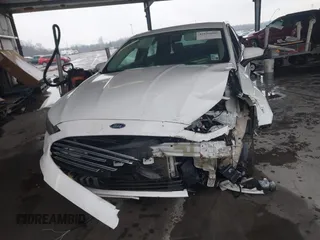 2017 Ford Fusion SE with VIN 3FA6P0H74HR196954, listed as a IAAI auction lot 41636002 with 70,366 mi miles and . Bid and sale history available at DreamBid. Image 12.