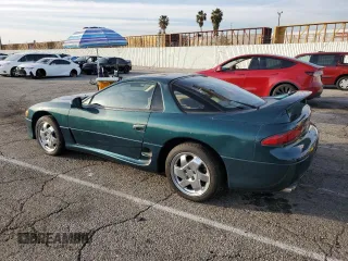 1997 Mitsubishi 3000GT GT z VIN JA3AM84J1VY004382, wystawiony jako Copart lot #45949465 z przebiegiem 166 552 mil mil oraz Czysty tytuł • Clean title. Historia ofert i sprzedaży dostępna na DreamBid. Obrazek 2.
