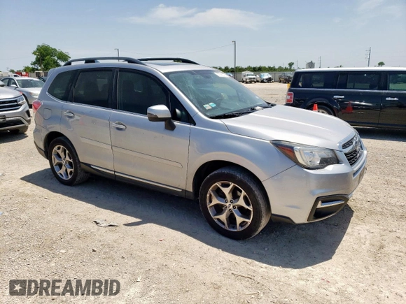 2017 Subaru Forester Touring with VIN JF2SJAWC1HH418997, listed as a Copart auction lot 57563195 with 139,239 mi miles and Clean title. Bid and sale history available at DreamBid. Image 4.