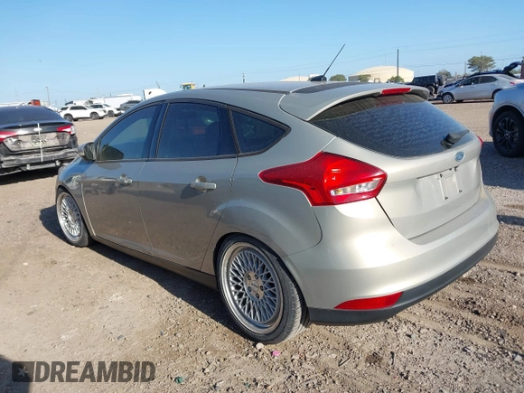 2015 Ford Focus SE with VIN 1FADP3K23FL261021, listed as a IAAI auction lot 42014802 with 157,283 mi miles. Bid and sale history available at carsss.com. Image 3.