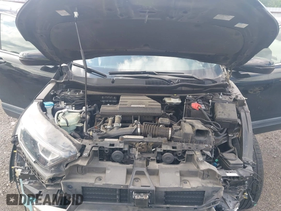 2018 Honda CR-V EX with VIN 7FARW1H59JE001943, listed as a IAAI auction lot 42123180 with 72,451 mi miles and . Bid and sale history available at carsss.com. Image 10.