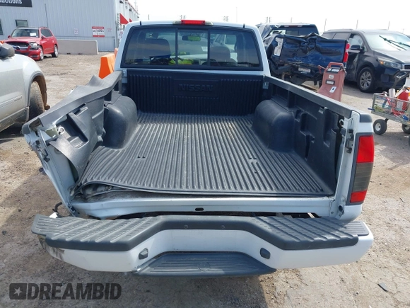 2004 Nissan Frontier XE z VIN 1N6DD26T14C479565, wystawiony jako IAAI lot #42010408 z przebiegiem Nie podano mil oraz . Historia ofert i sprzedaży dostępna na DreamBid. Obrazek 16.