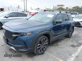 2024 Mazda CX-50 2.5 Turbo with VIN 7MMVABXY1RN237106, listed as a IAAI auction lot 42117311 with 3,135 mi miles and . Bid and sale history available at DreamBid. Image 17.