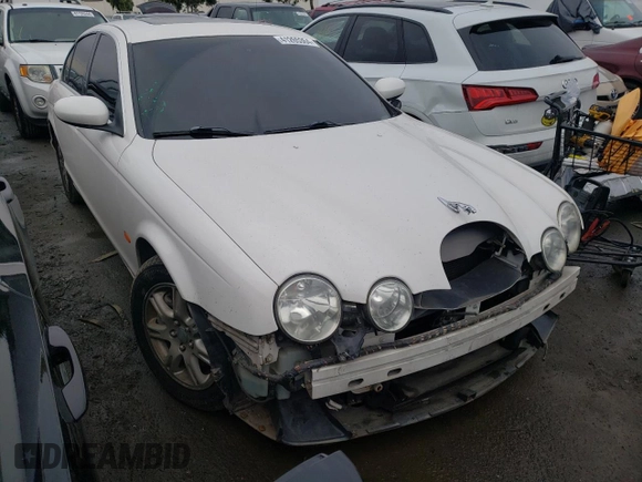 2003 Jaguar S-Type with VIN SAJEA01T43FM87170, listed as a Copart auction lot 41265364 with 79,273 mi miles and Non Repairable. Bid and sale history available at DreamBid. Image 4.