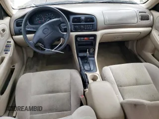 1998 Mazda 626 DX with VIN 1YVGF22CXW5733338, listed as a Copart auction lot 71796184 with 196,218 mi miles and Salvage Title. Bid and sale history available at carsss.com. Image 8.