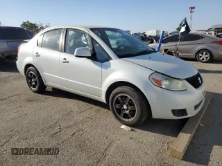 2009 Suzuki SX4 Man FWD with VIN JS2YC412796200908, listed as a Copart auction lot 73821924 with 125,721 mi miles and Salvage Title. Bid and sale history available at carsss.com. Image 4.
