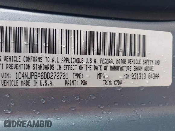 2013 Jeep Patriot Sport with VIN 1C4NJPBA6DD272701, listed as a IAAI auction lot 42014123 with 190,509 mi miles. Bid and sale history available at carsss.com. Image 9.