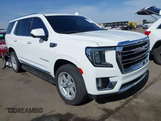 2021 GMC Yukon SLT z VIN 1GKS1BKD8MR250738, wystawiony jako IAAI lot #41996570 z przebiegiem 85 905 mil mil oraz . Historia ofert i sprzedaży dostępna na DreamBid. Obrazek 1.
